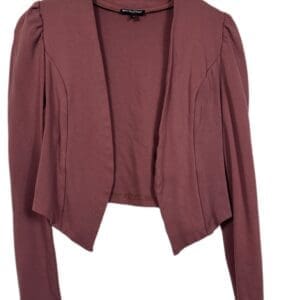 A mauve, open-front cardigan with long sleeves hangs on a wooden hanger against a white background.