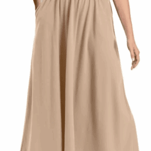 Someone wearing the Cotton Long Skirt, a beige ankle-length A-line skirt featuring an elastic waistband and pockets.