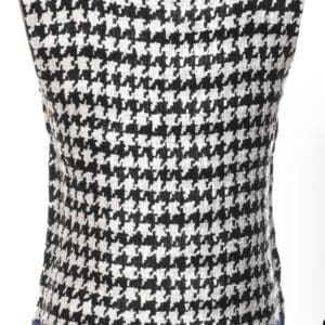 Sleeveless black and white houndstooth patterned top with a textured blue band at the hem, displayed on a plain background.