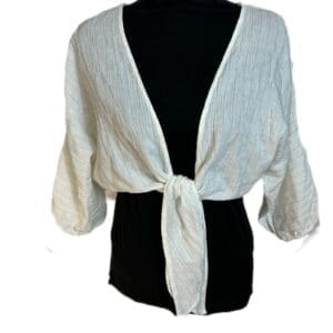 Cream & Tan Tied Puff Sleeves Crop Top with subtle stripes and a front tie, displayed on a black mannequin torso against a white background.