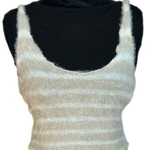 A cream and white striped, fuzzy knit tank top with wide straps displayed on a black mannequin torso.