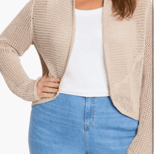 A person wearing a beige Crochet Cardigan over a white top and high-waisted blue jeans, with one hand on their hip.