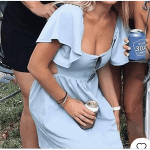 Three people stand together outdoors; the center person wears a Short Tie Back Puff Sleeve Dress in light blue, holds a can, and has sunglasses hanging from the dress.