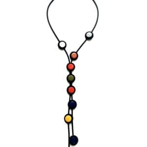 The Flowered Tie Back Crop Top showcases a linear, geometric pattern with round, colorful beads in red, yellow, blue, orange, green, and white on a black base.