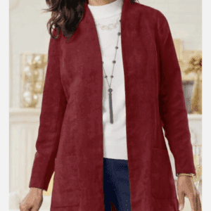 Woman wearing a Red Ruffle Wrist & Neck Blouse with Blign Rose, paired with jeans and layered necklaces, standing indoors.