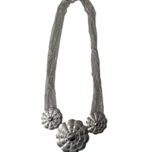 Flowered Tie Back Crop Top featuring a vibrant floral pattern and adjustable back ties, displayed on a white background.