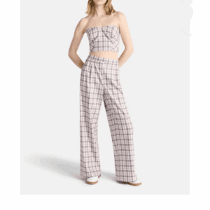 A person models the Plaid Strapless Top Pants Suit, featuring a strapless crop top and matching high-waisted wide-leg pants, standing with hands behind their back against a plain background.