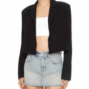 A person wearing a Short Cropped Blazer in black, paired with a white bandeau top and a light blue raw-hem denim mini skirt.