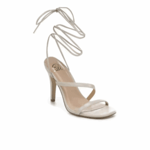The Tie Up Leg Heels are beige high-heeled sandals with thin straps and long laces that wrap around the ankle, shown on a white background.