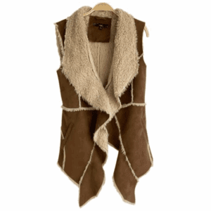 The Off the Shoulder Be Bold Top is displayed on a wooden hanger against a white background.
