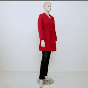 A mannequin dressed in a 2 pc pink wide leg pants set stands on a circular display platform against a plain white background.