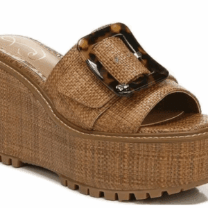 The Woven Buckle Wedge Flip Flop is a brown platform sandal featuring a thick sole, open toe, and a prominent tortoiseshell buckle across the top.