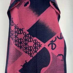 A Long Tassel Adjustable Waist Belt Skirt featuring pink and navy blue abstract shapes and geometric designs, displayed vertically against a plain background.