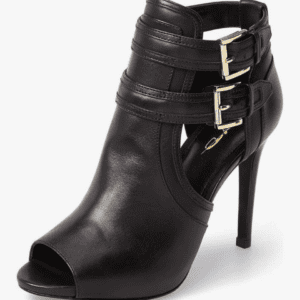 Black high-heeled peep-toe ankle boot with two gold buckle straps and cut-out side detailing.