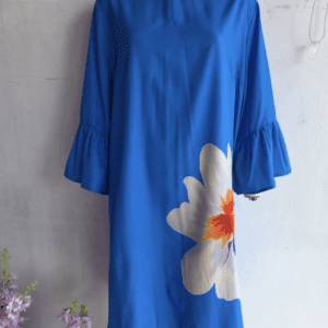 A thin royal blue one-shoulder shirt dress in size S, featuring ruffled three-quarter sleeves and a bold white and orange floral print on one side, displayed on a mannequin.