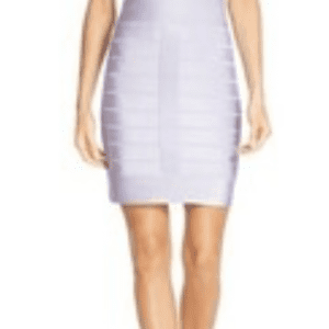 A woman wears a SIZE 12 Striped Bandage Cutout Dress with nude high-heeled sandals, standing against a plain background.