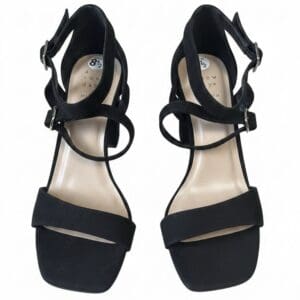 A pair of black open-toe heeled sandals with ankle straps and square toes, viewed from above on a white background.