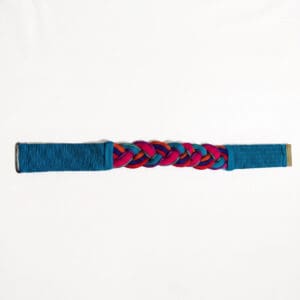 A braided belt with blue, red, and purple sections, featuring a silver buckle on one end and a gold tip on the other, displayed on a plain white background.