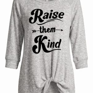 A heather gray long-sleeve shirt with front knot detail, featuring the phrase “Raise them Kind” in bold black script with an arrow graphic.