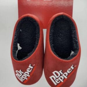 A pair of red Dr Pepper branded slippers in size M 7/8 hang on a red display card with the Dr Pepper logo against a plain background.